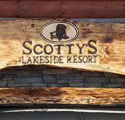 Scottys Lakeside Resort by Kerr Chainsaw Carving